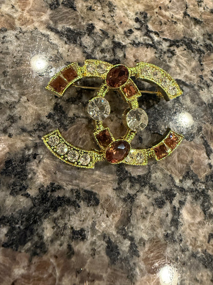 CC brooch pin