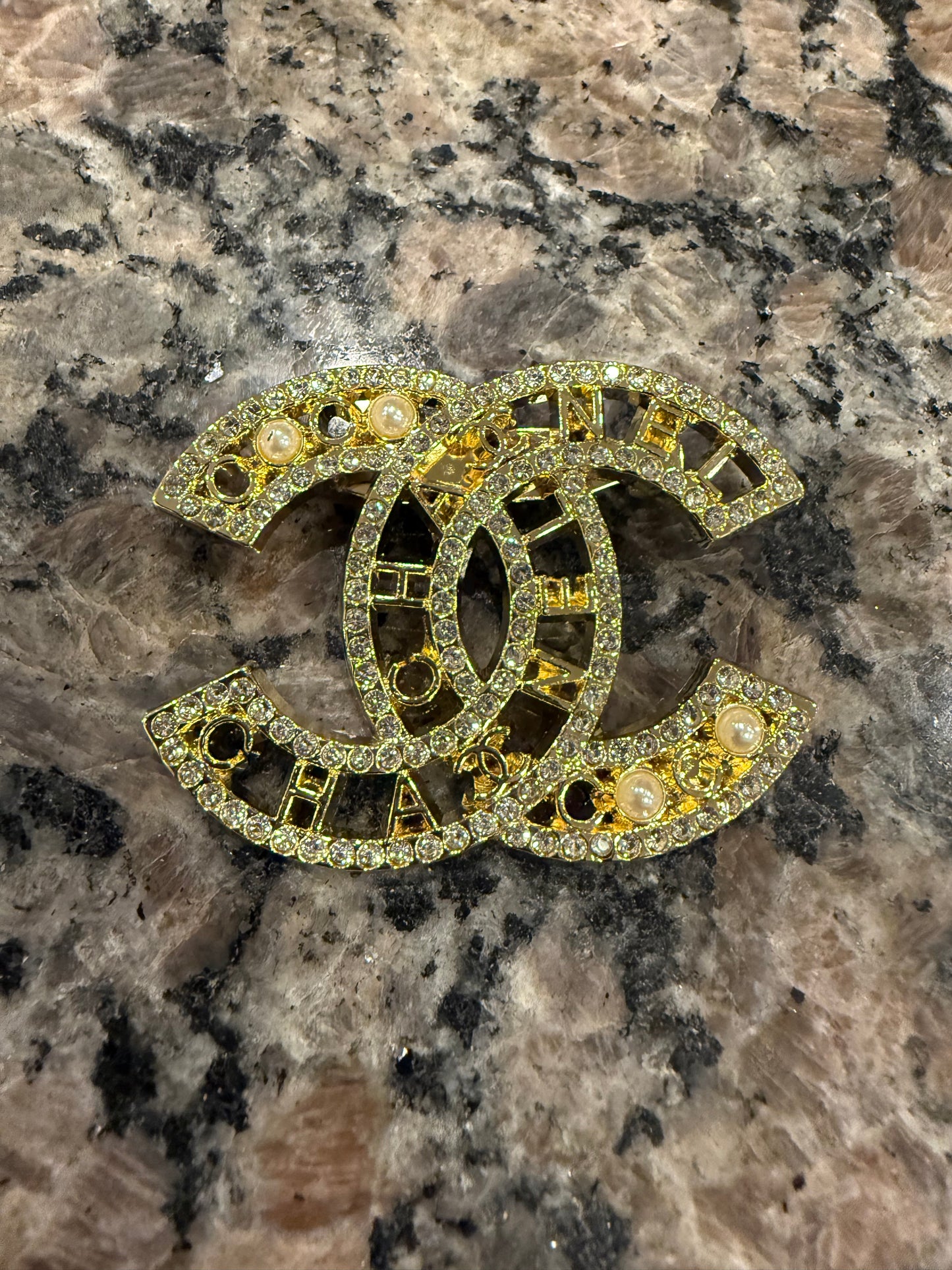 CC brooch pin