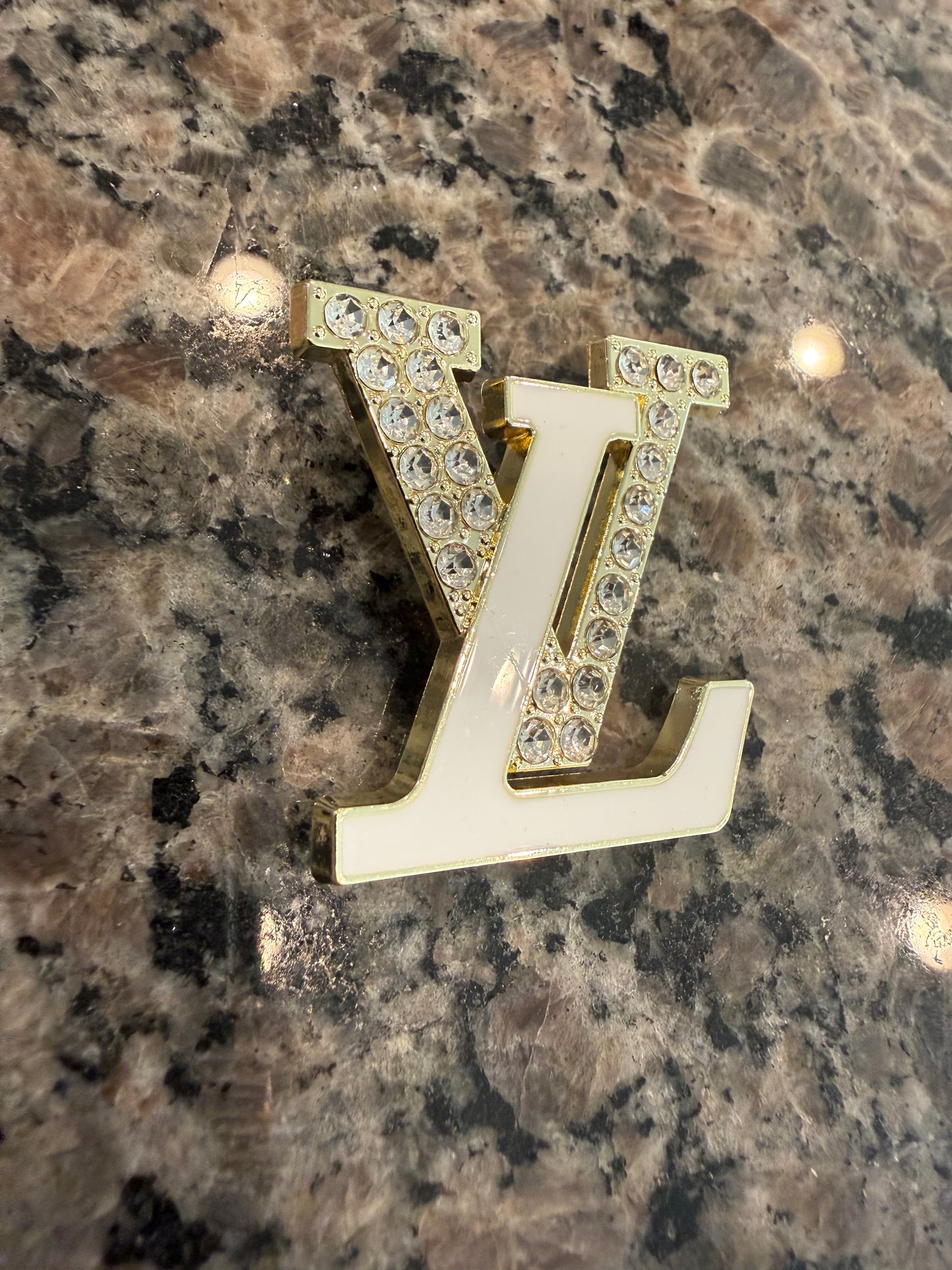Gold and white brooch
