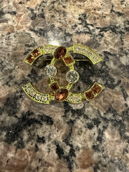 CC brooch pin