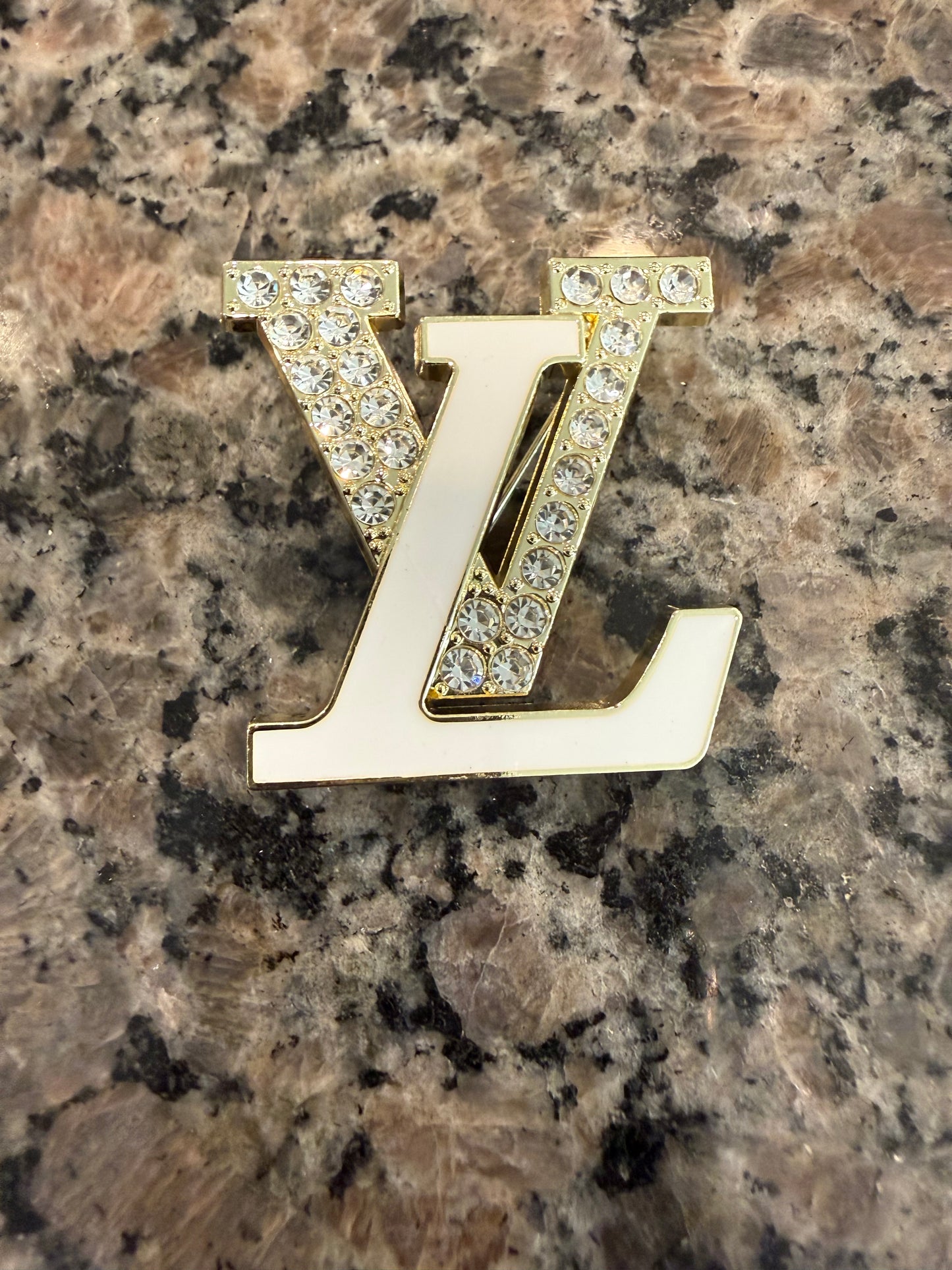Gold and white brooch
